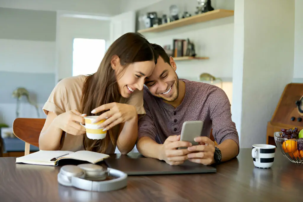 smiling American couple with coffee